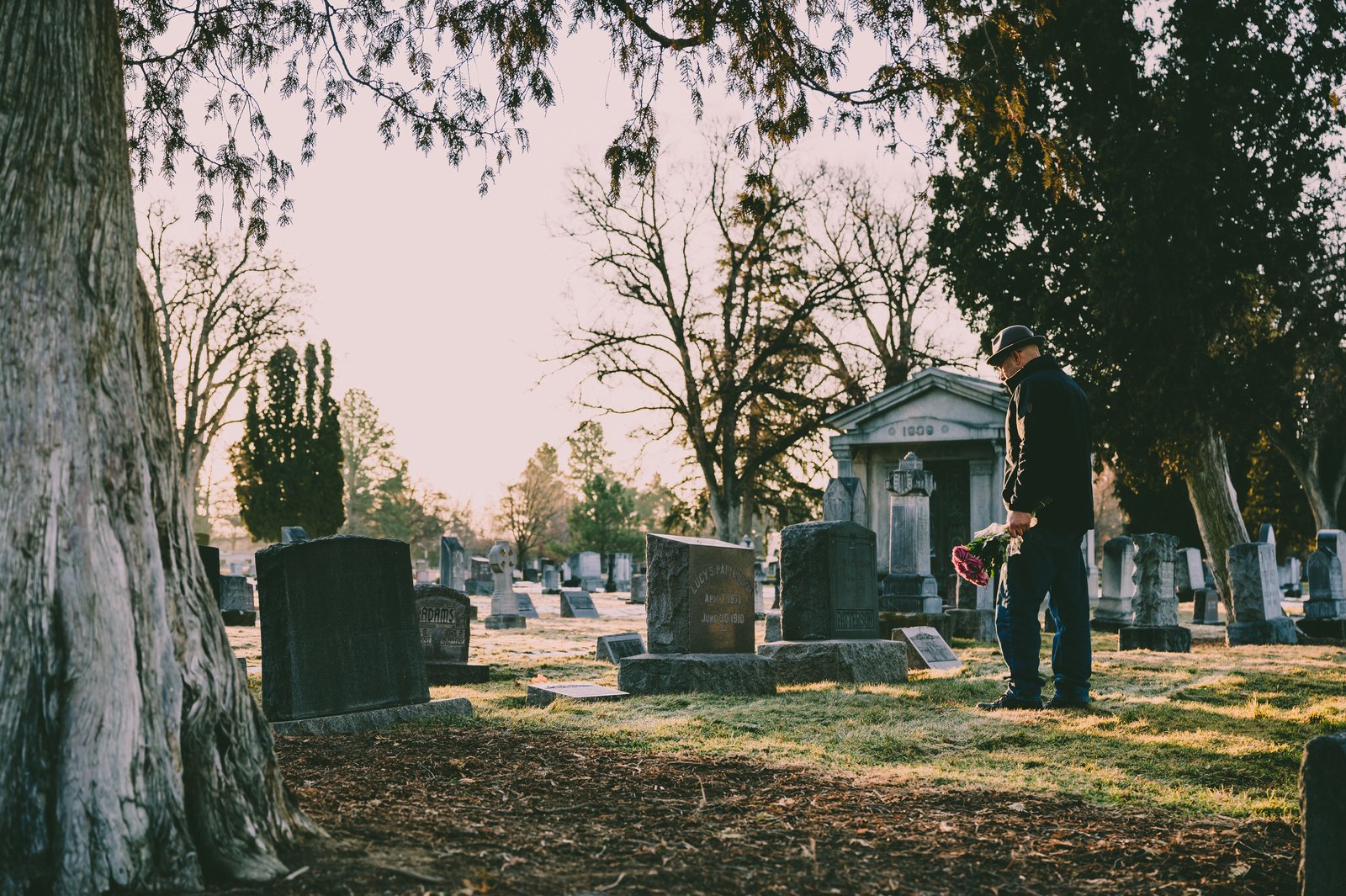 rsz_1man-in-black-jacket-standing-in-front-of-grave-3648309